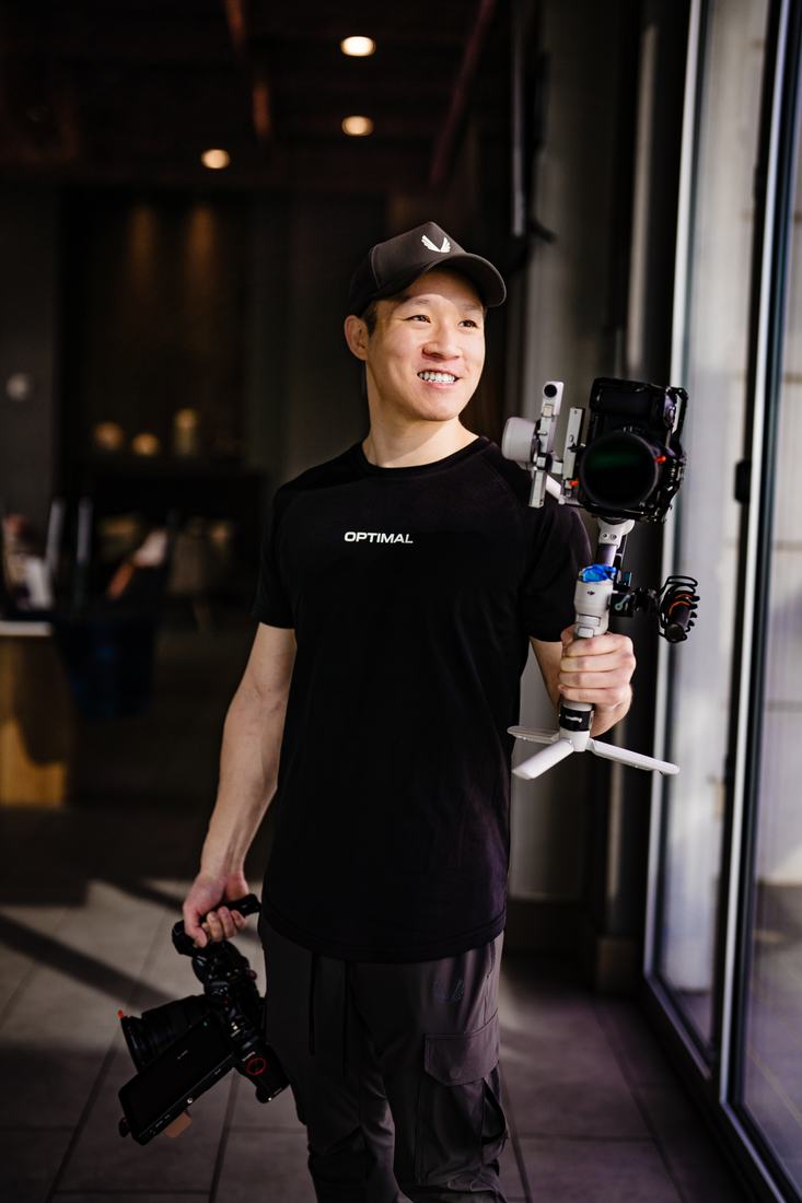 Darien Chui holding a camera rig on a gimbal