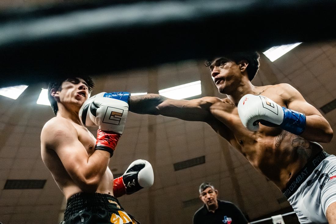 Punch thrown through the ropes, shot from ring level